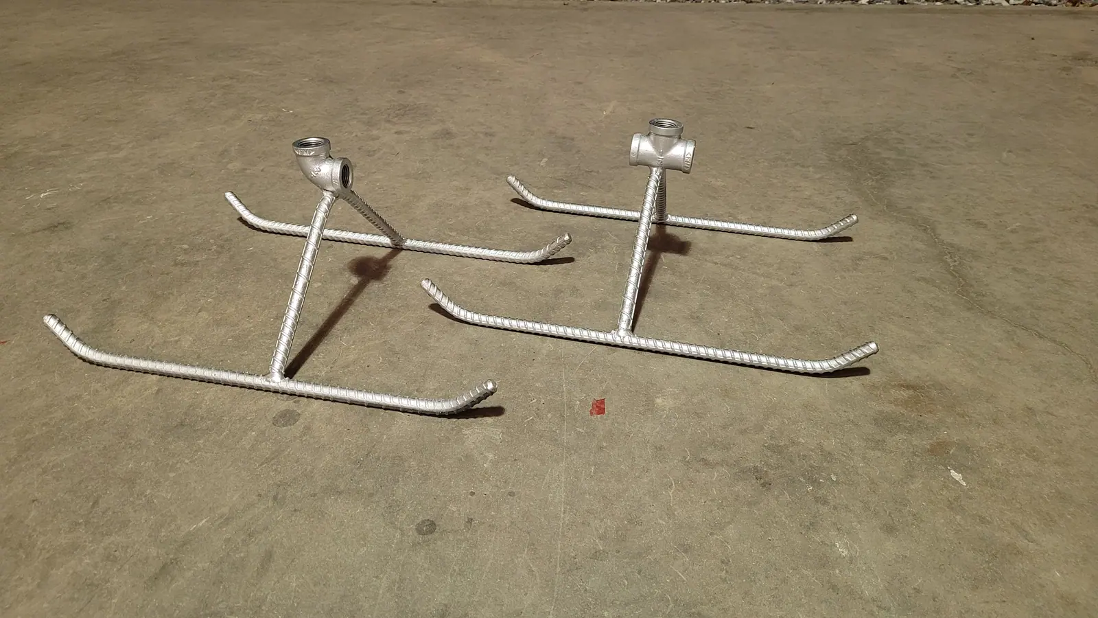 Two rebar sled bases on the shop pad